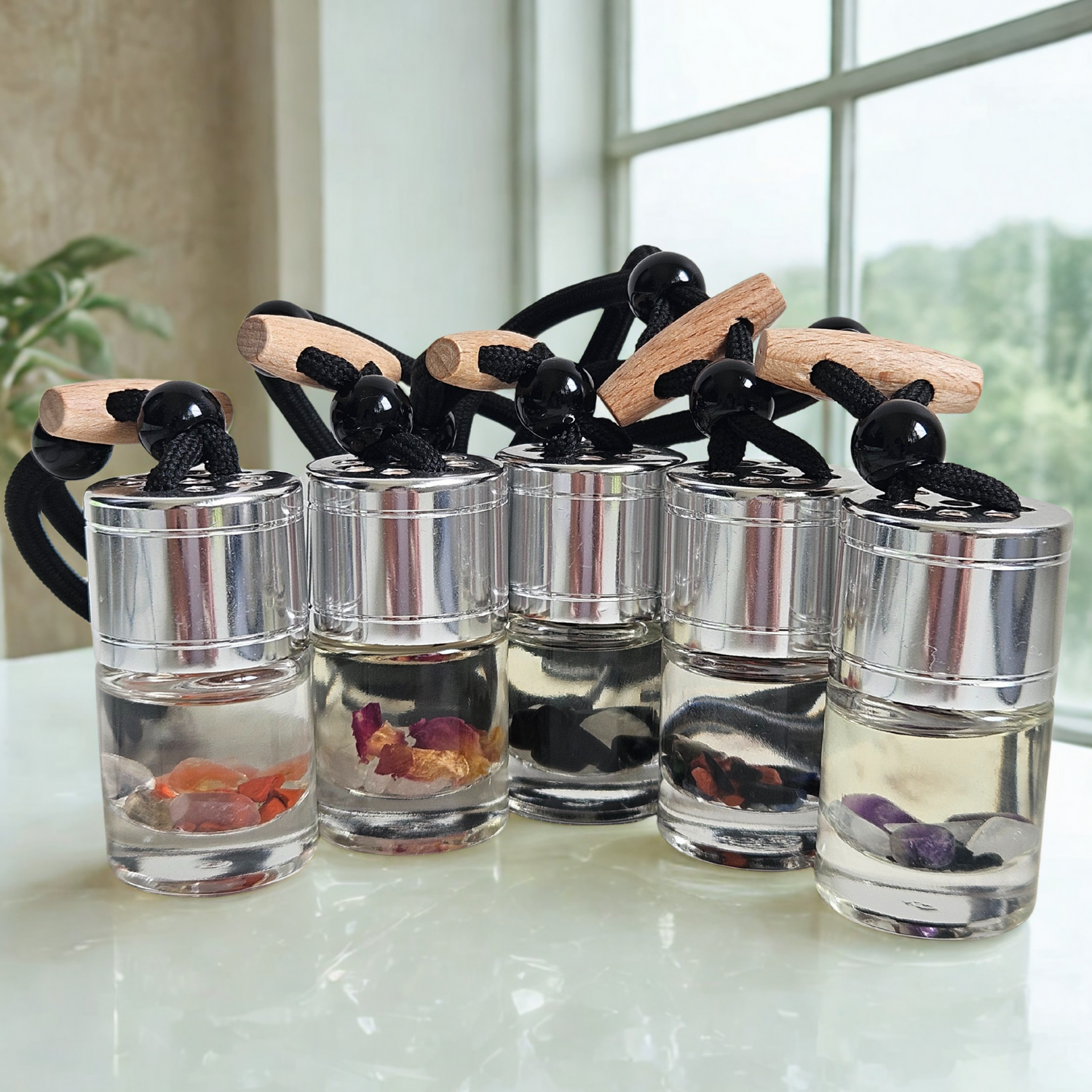 Alle DreamOn Auto-Lufterfrischer – Duftdiffuser mit Glasflakon in fünf Intentionen: Liebe, Schutz, Selbstliebe, Träume & Angst