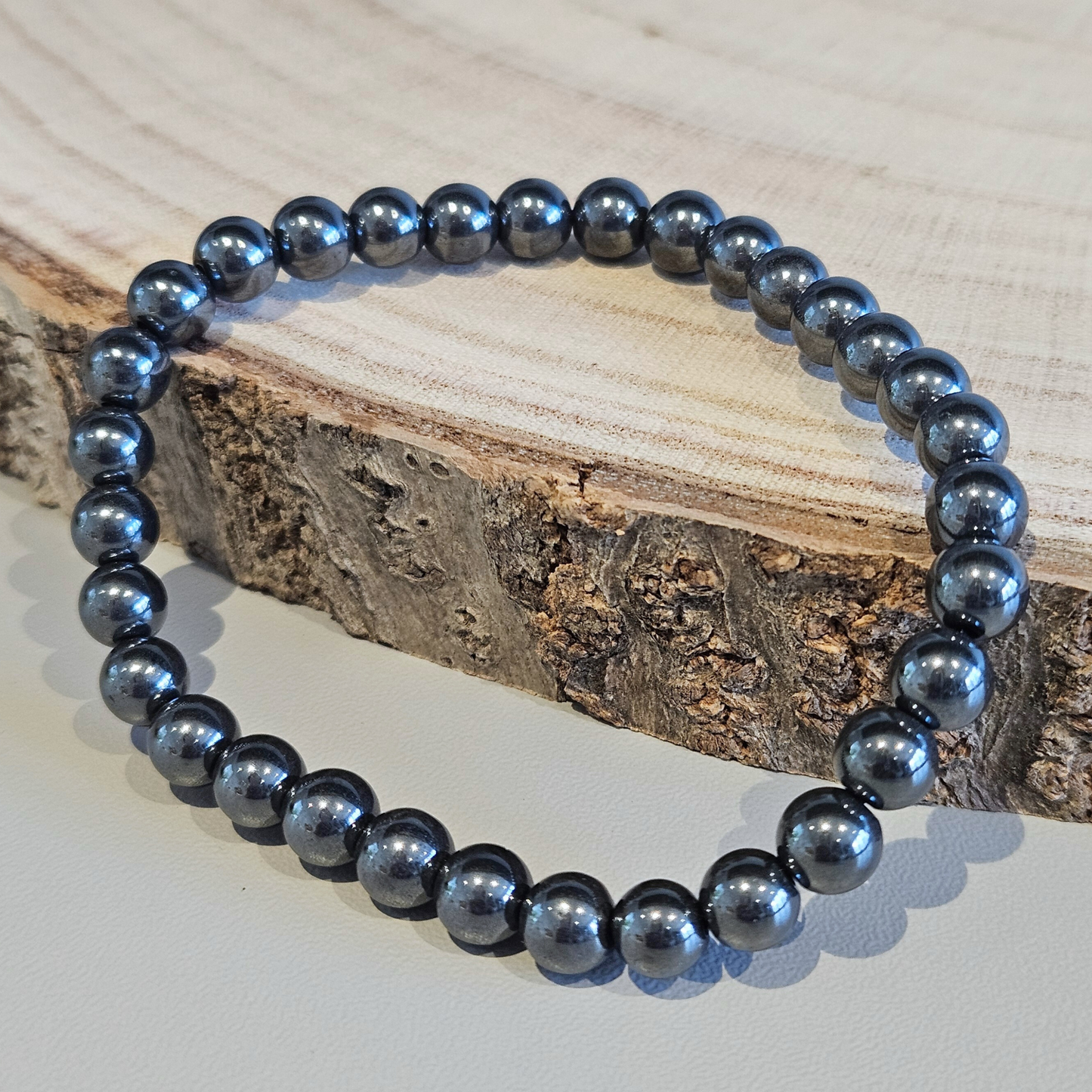 Echtes Hämatit Edelsteinarmband 6 mm, schimmernd grau, DreamOn