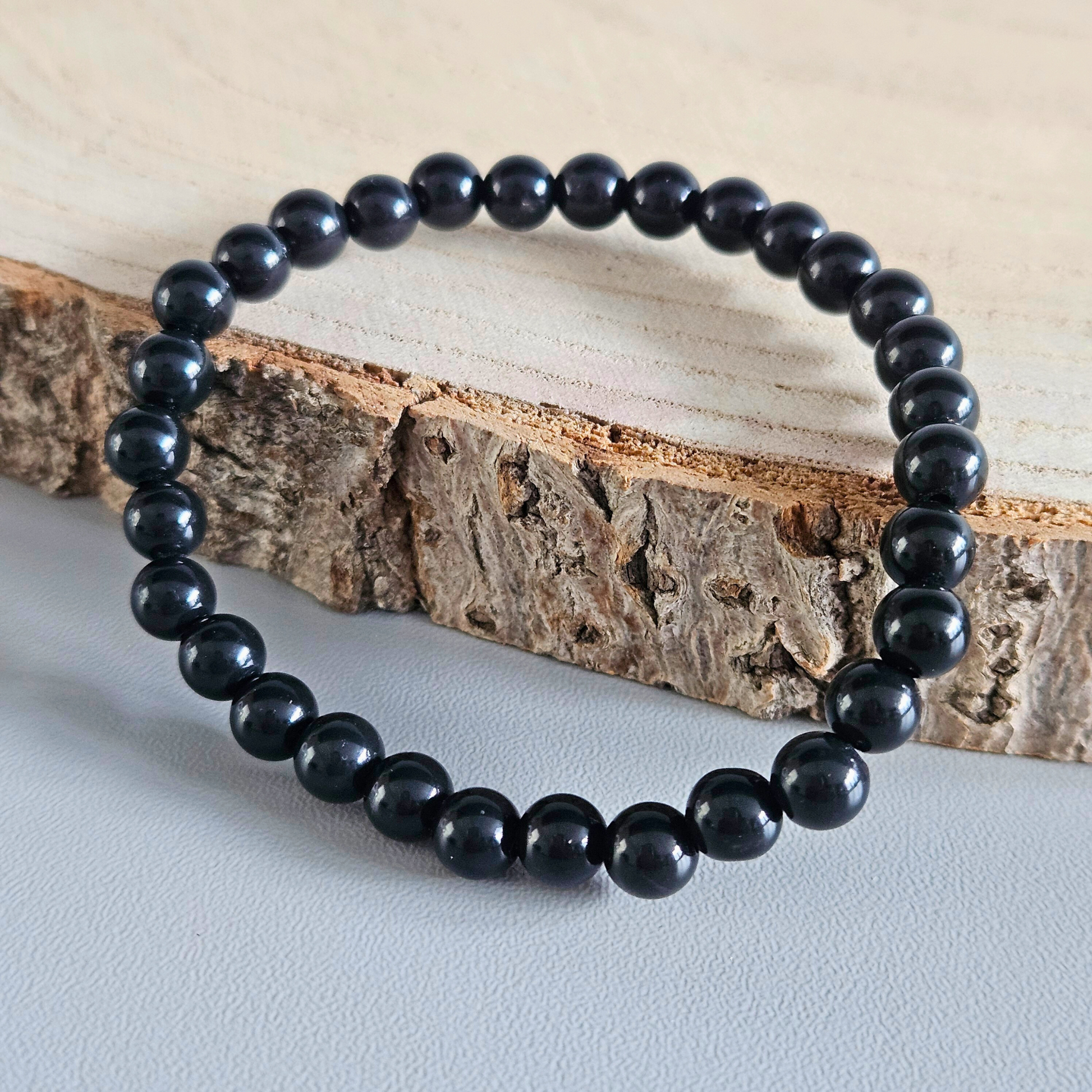 Edelstein Armband Onyx aus echten 6 mm Steinen – hochwertiger spiritueller Schmuck, DreamOn Produktfoto.