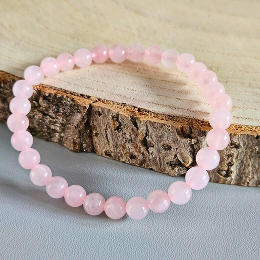 Edelstein Armband Rosenquarz aus echten 6 mm Steinen – hochwertiger spiritueller Schmuck, DreamOn Produktfoto.