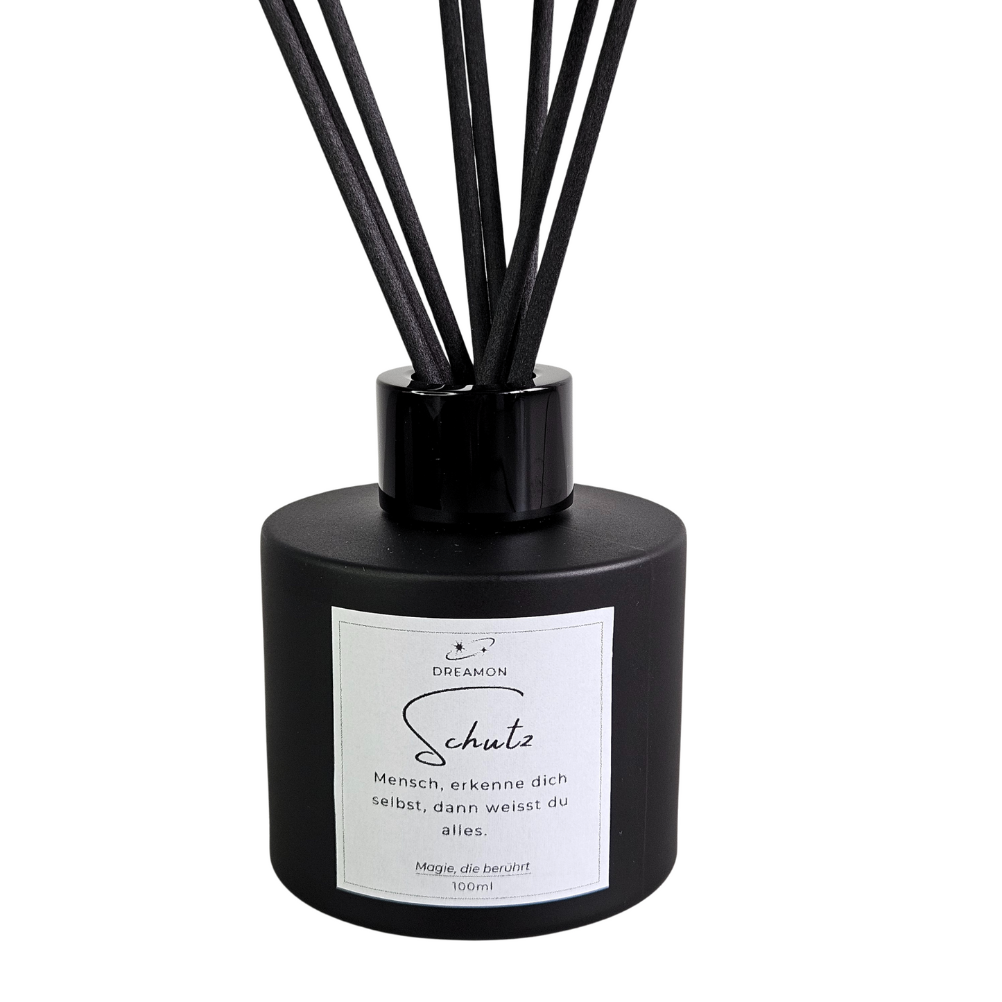 Raumduft „Schutz“ – energetischer Diffuser gegen negative Energien in schwarzer Flasche – Nahaufnahme vom Etikett