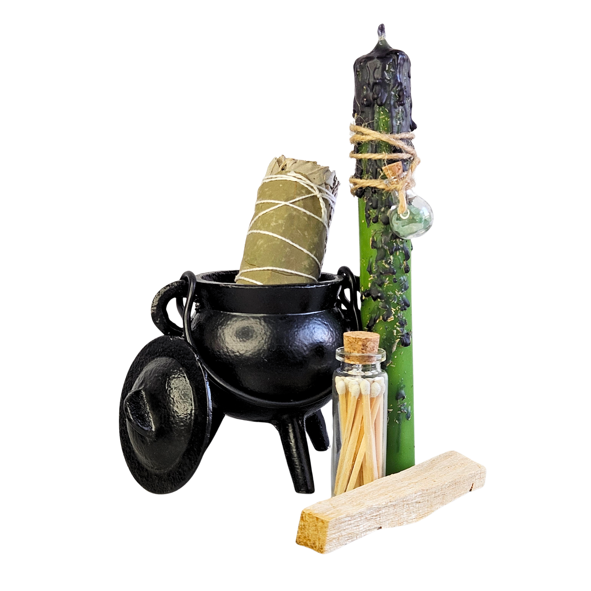 Ritualset mit schwarzem Hexenkessel, grüner Ritualkerze für Fülle, Smudge aus Salbei & Eukalyptus, Palo Santo Holzstück und Streichhölzern im Glas.