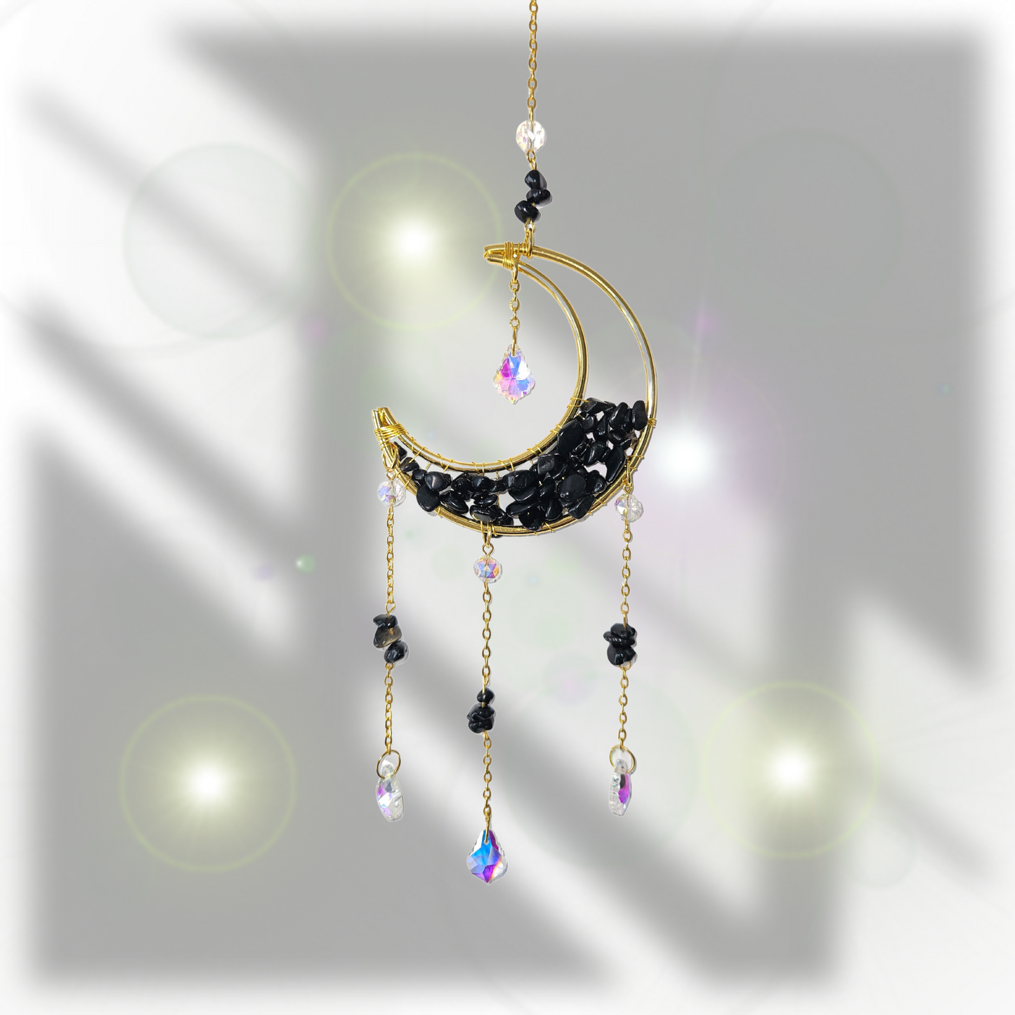 Kleiner Suncatcher mit schwarzem Onyx –  funkelnd im Sonnenschein, schützender Lichtfänger für Erdung & innere Kraft