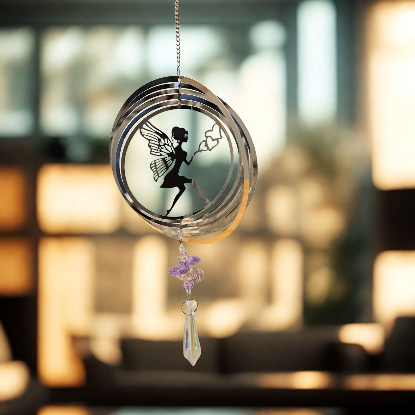 Windspiel Fee in Bewegung mit Lichtreflexen