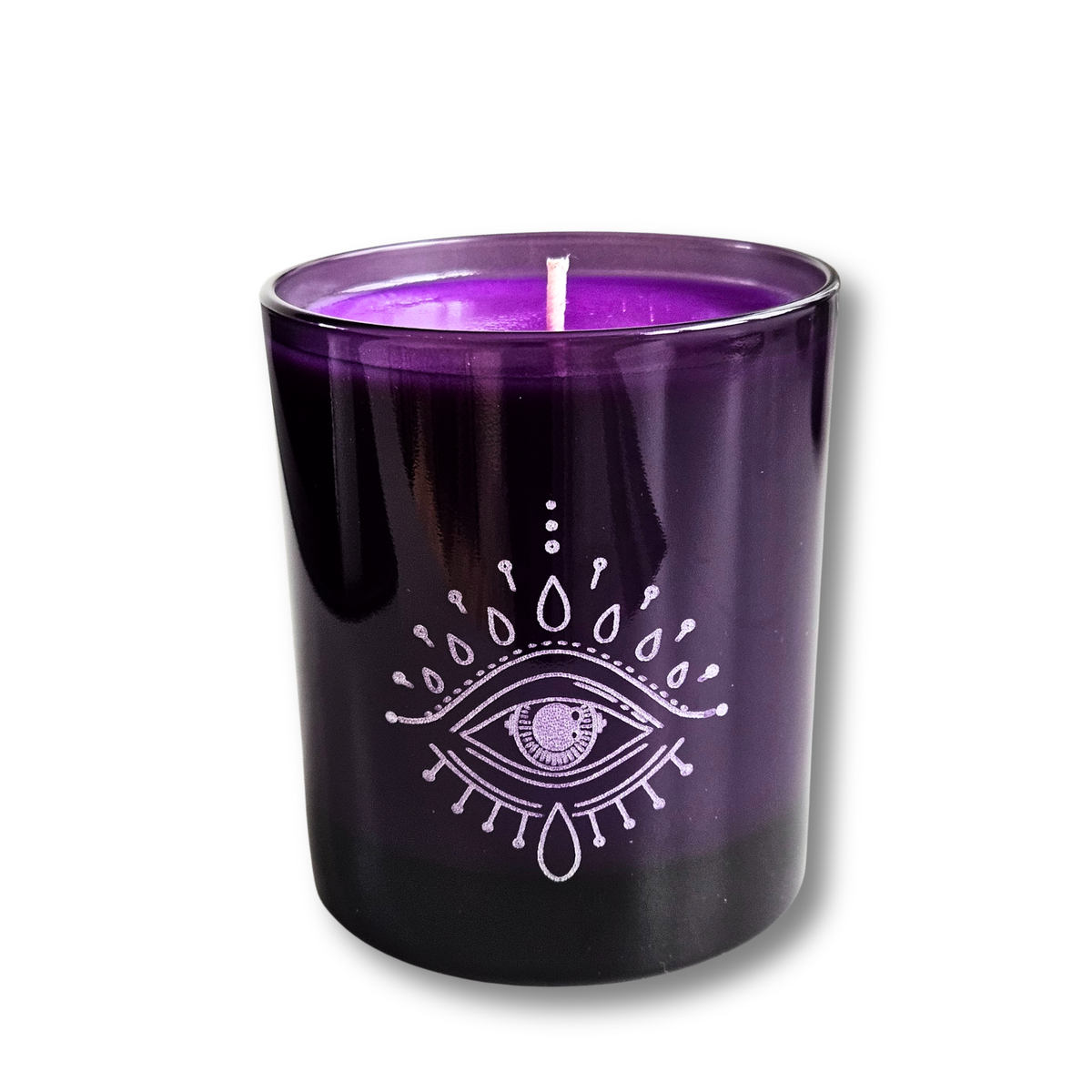 Vorderansicht der Moonlight Kerze Starry Night im violetten Glas auf weißem Hintergrund.