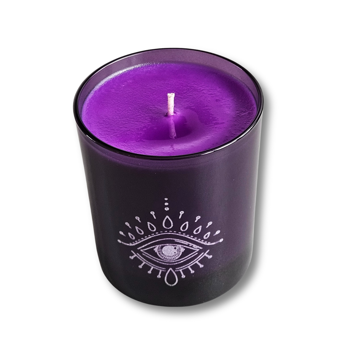 Schräge Draufsicht auf das violette Sheawachs der geöffneten Moonlight Kerze Starry Night im violetten Glas.